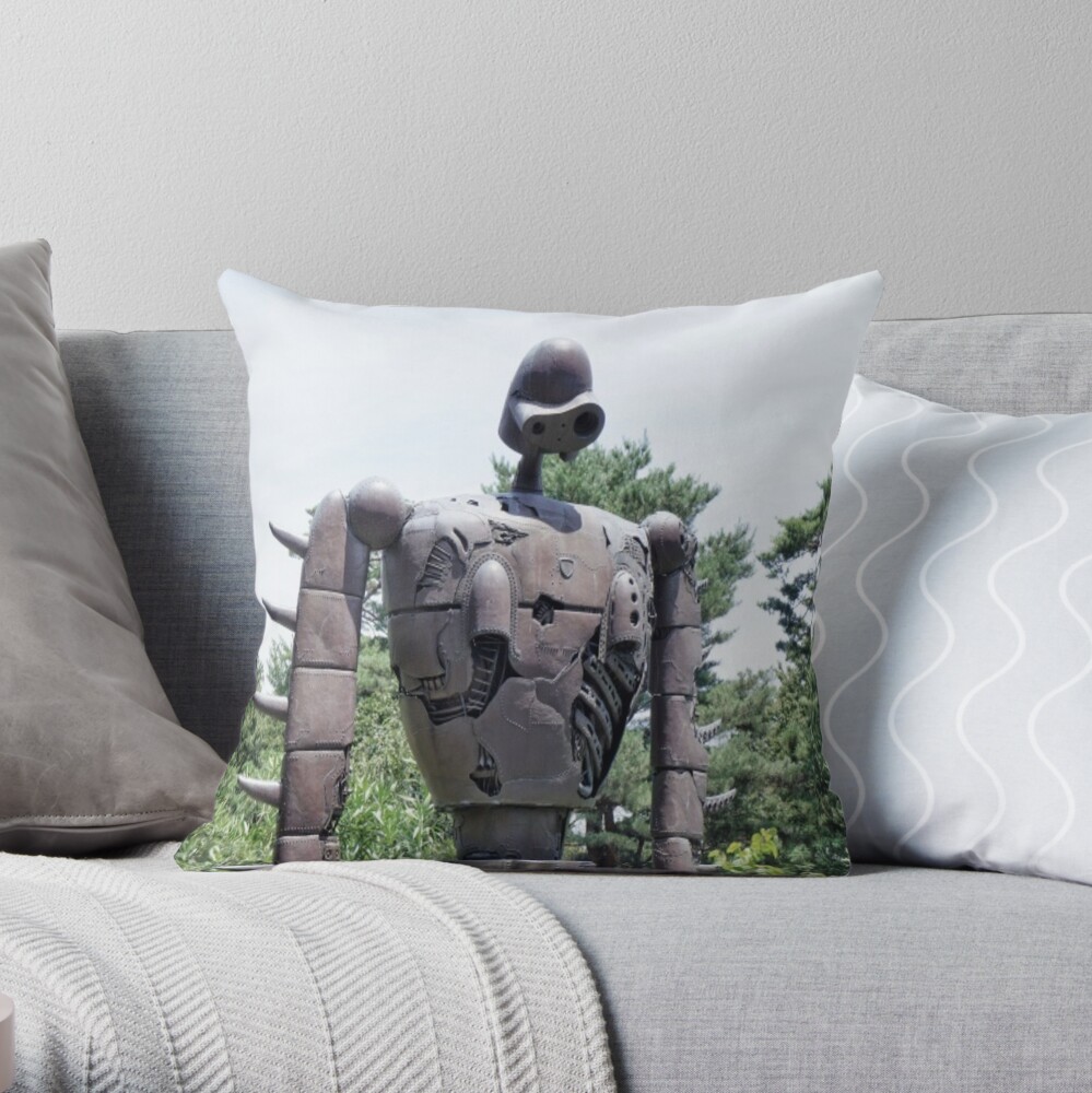 A Giant Metal Robot Statue Throw Pillow